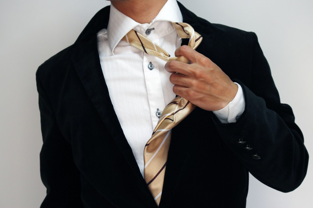 Taking off a tie Start new buiness